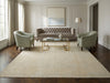 Load image into Gallery viewer, Living room with a beige rug, gray sofa, and two armchairs.