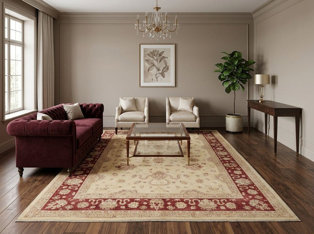 Living room with a burgundy sofa, coffee table, and decorative rug.