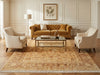 Load image into Gallery viewer, Living room with mustard yellow sofa, beige armchairs, and a patterned rug.