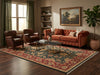 Load image into Gallery viewer, A styled living room featuring a large traditional patterned area rug in red, blue, and beige tones.