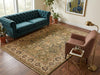 Load image into Gallery viewer, A large traditional-style area rug with an intricate floral and scroll pattern in beige, brown, and muted gold tones.
