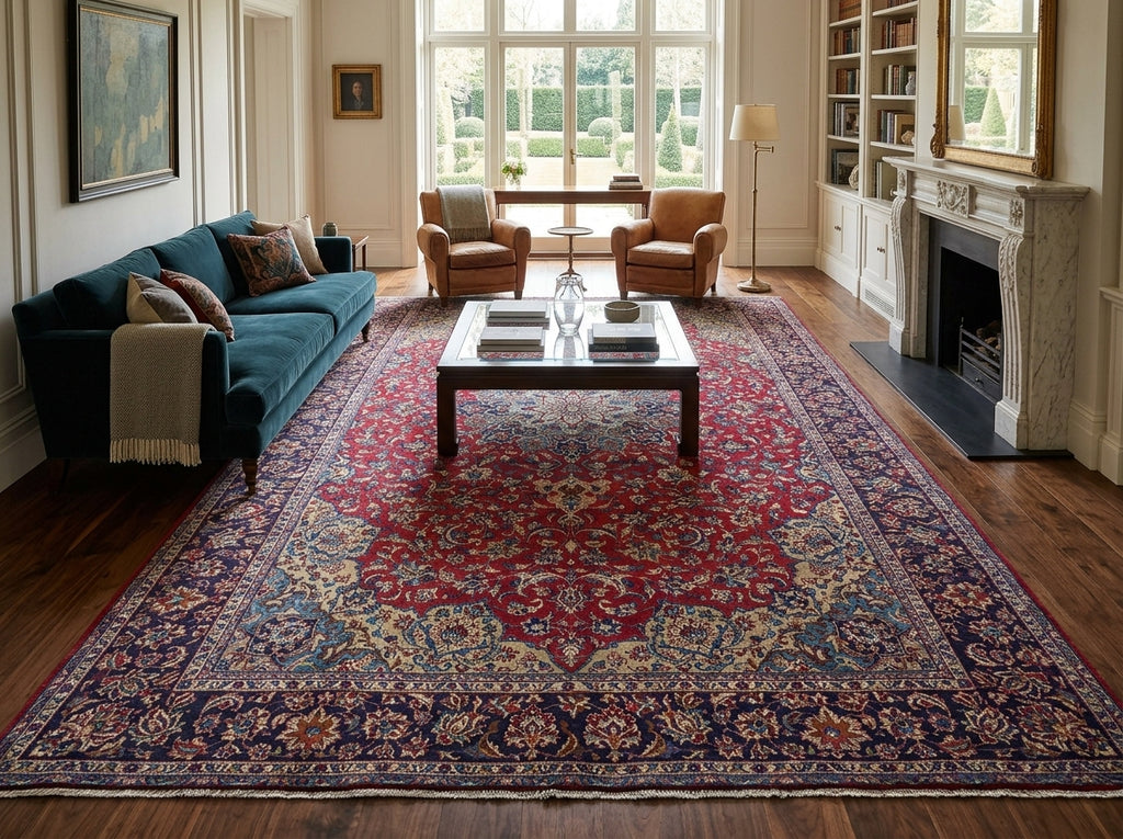 A large traditional oriental area rug with a red, blue, and beige floral pattern, styled in a classic living room.