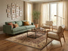Load image into Gallery viewer, A styled living room scene with  a patterned area rug.