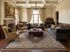Load image into Gallery viewer, Luxurious living room with decorative rug.