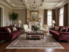 Load image into Gallery viewer, Luxurious living room with decorative rug.