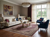 Load image into Gallery viewer, Modern living room with a decorative rug