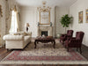 Load image into Gallery viewer, Luxurious living room with a decorative rug.