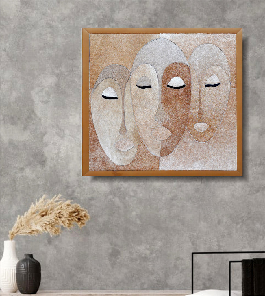 Handcrafted Tribal Essence: Abstract Triple Mask Portrait Cowhide Mosaic Wall Art
