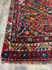 Load image into Gallery viewer, Detail of 5x7 tribal rug navy border and red field #P1200