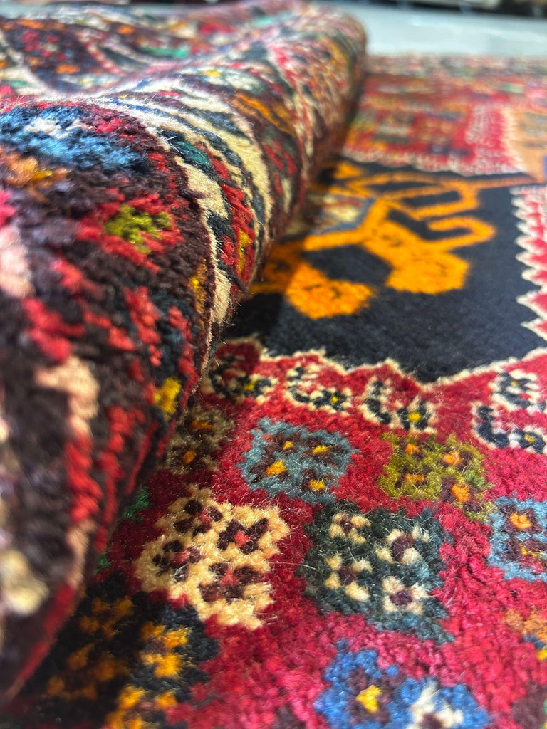 Close-up of medallion rug design, red and navy entryway rug #P1200