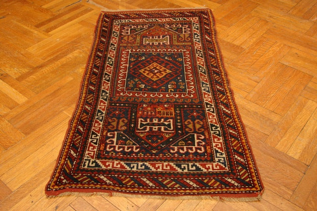 Luxurious-Antique-Caucasian-Rug.jpg