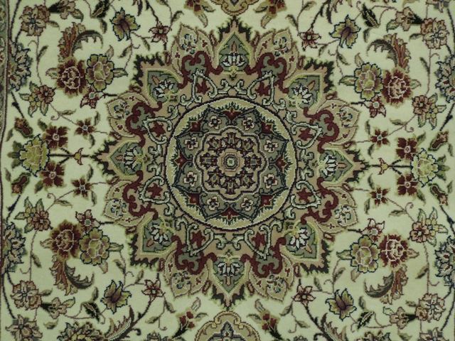 Traditional-Hand-knotted-Wool-&-Silk-Rug.jpg