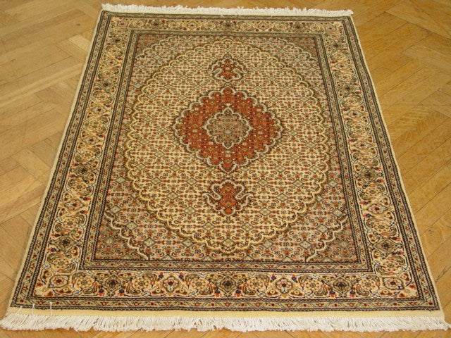 Authentic-Hand-knotted-Persian-Tabriz-Rug.jpg 