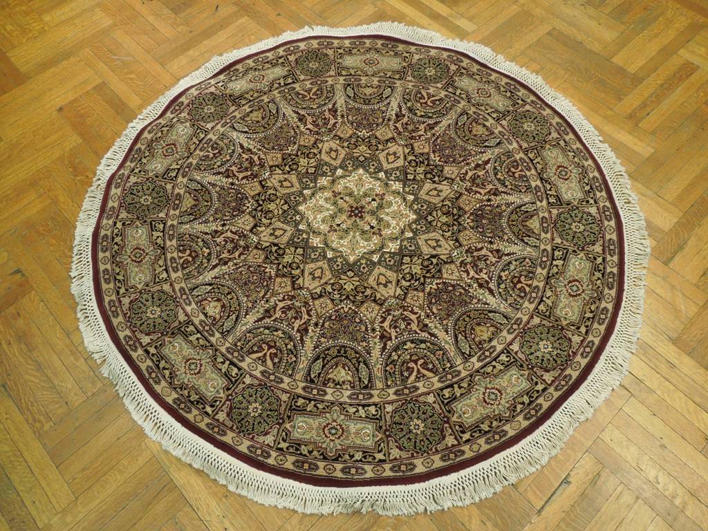 Fine-Quality-Wool-Silk-Round-Rug.jpg