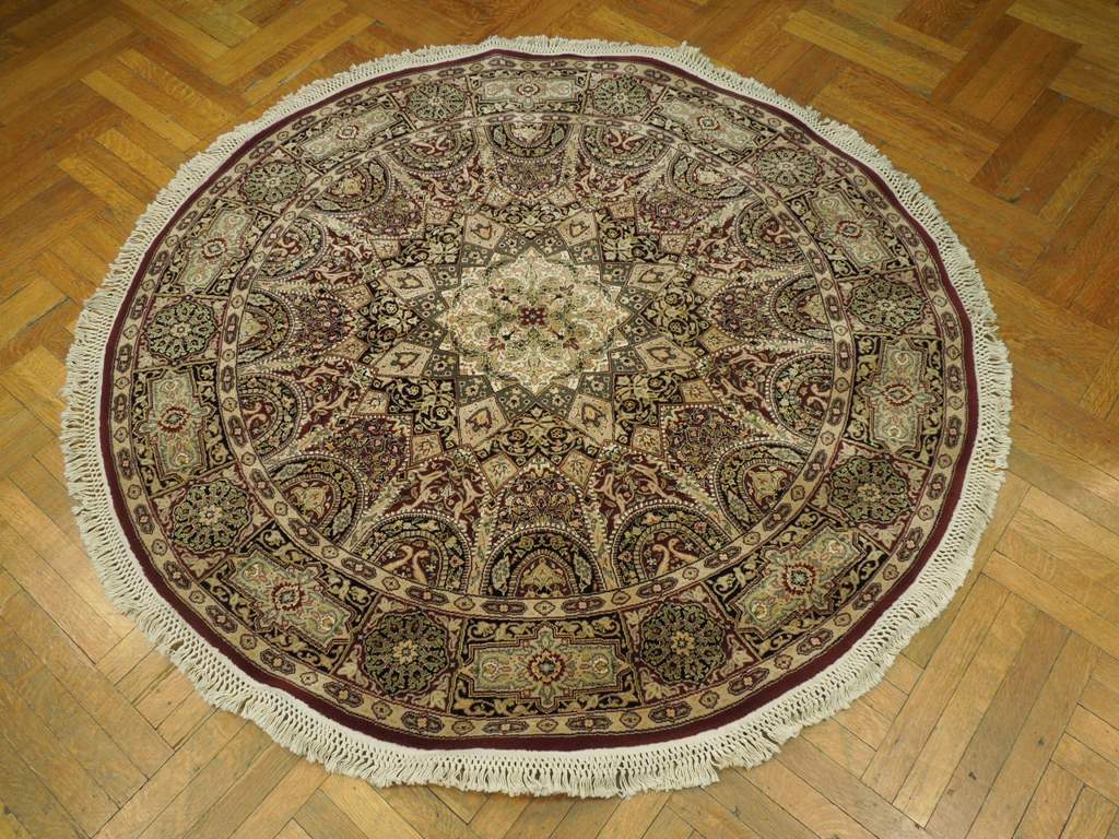 Fine-Quality-Wool-Silk-Round-Rug.jpg