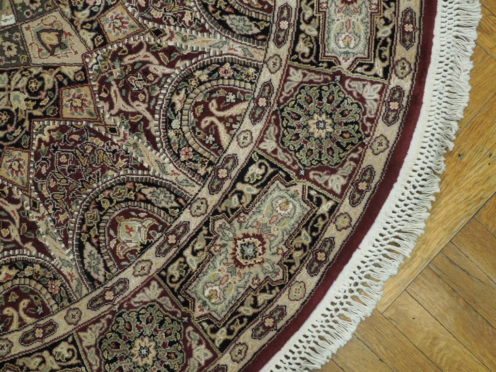 Fine-Quality-Wool-Silk-Round-Rug.jpg