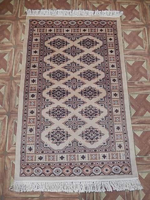 Luxurious-Hand-knotted-Bokhara-Rug.jpg 