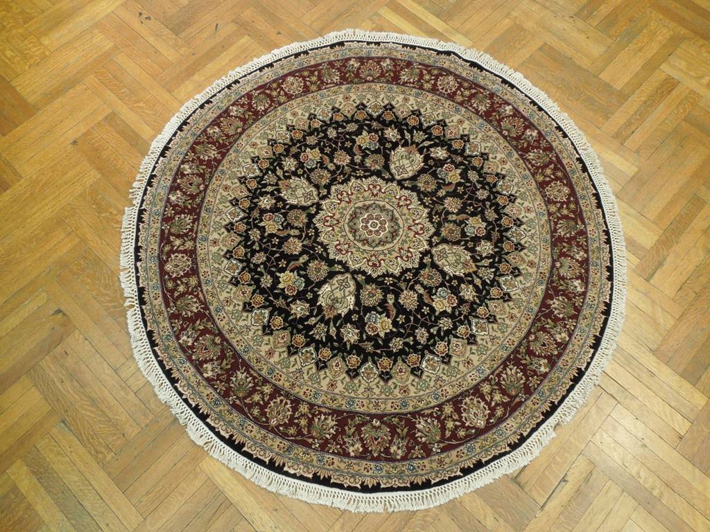 Fine-Quality-Wool-Silk-Round-Rug.jpg 