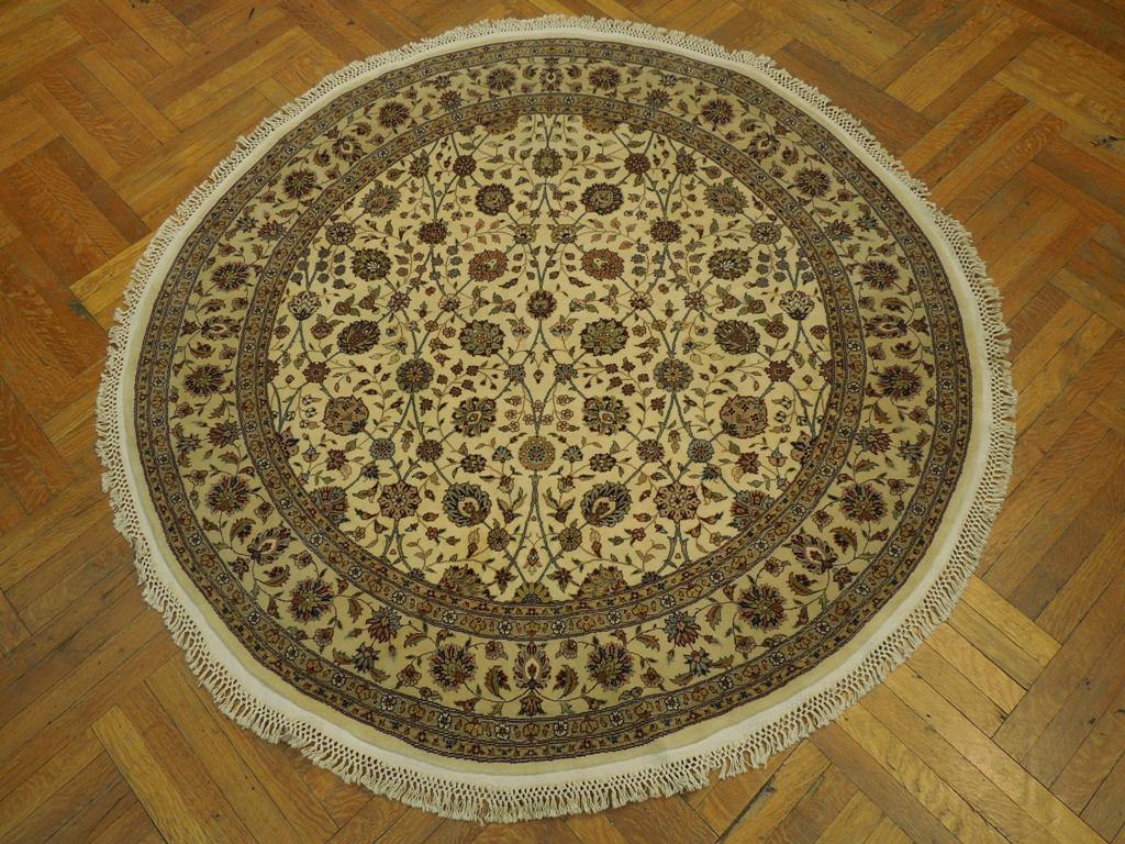 Fine-Quality-Wool-Silk-Round-Rug.jpg