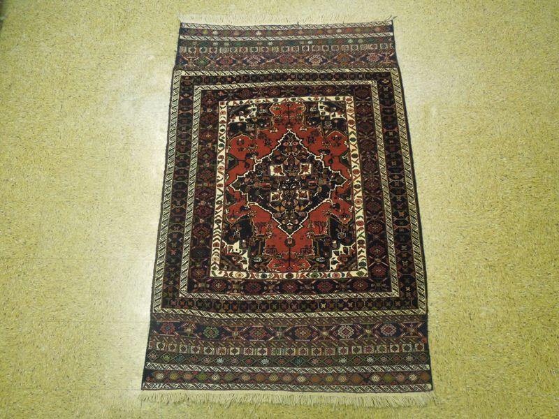 Hand-knotted-Persian-Tribal-Wool-Rug.jpg