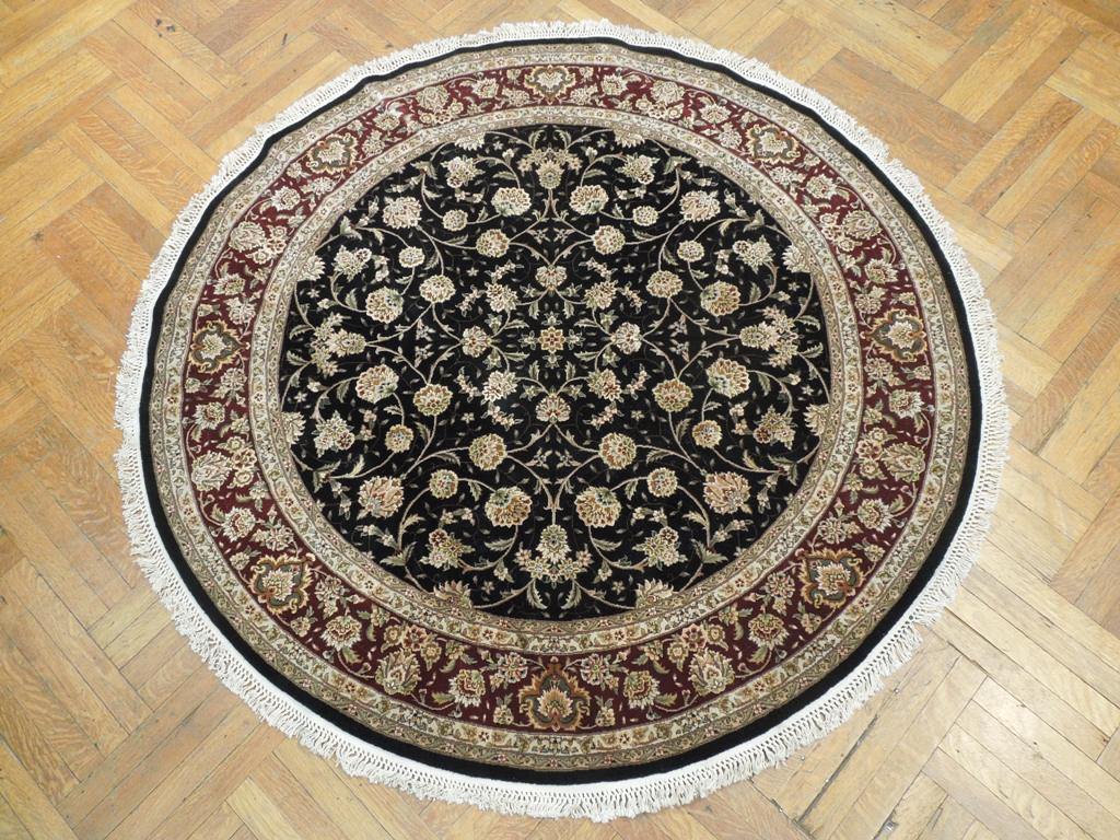 Fine-Quality-Wool-Silk-Round-Rug.jpg 
