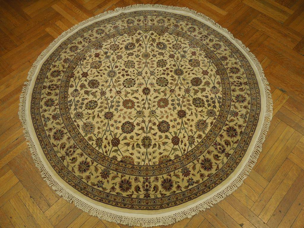 Fine-Quality-Wool-Silk-Round-Rug.jpg