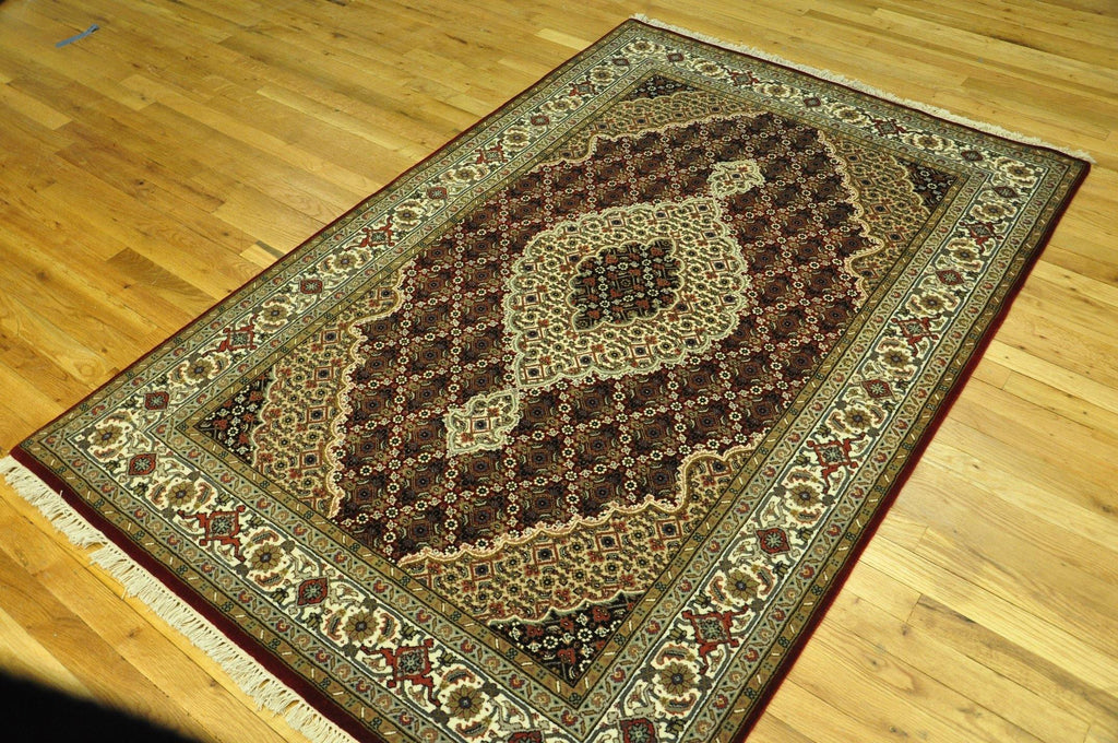 Hand-knotted-Wool-Silk-Tabriz-Mahi-Rug.jpg
