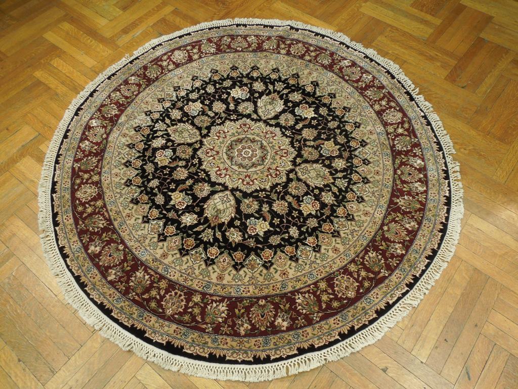 Fine-Quality-Wool-Silk-Round-Rug.jpg 
