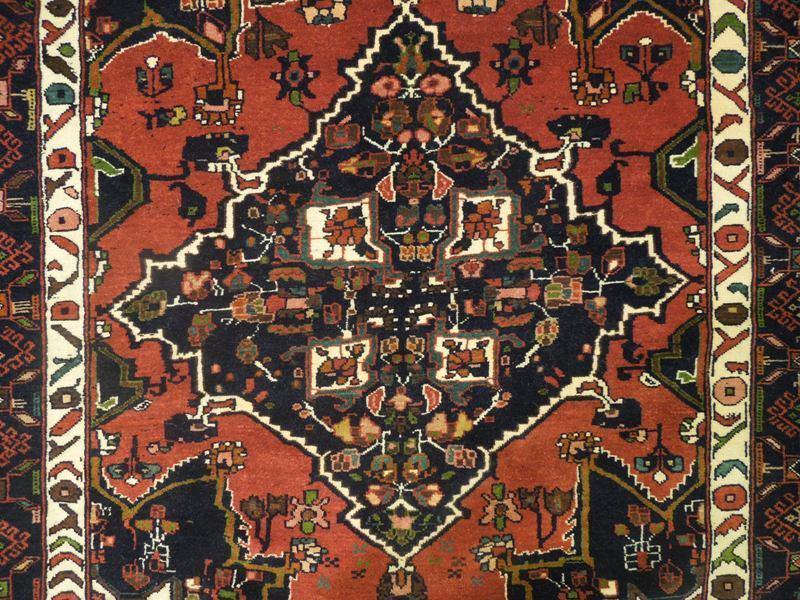 Hand-knotted-Persian-Tribal-Wool-Rug.jpg