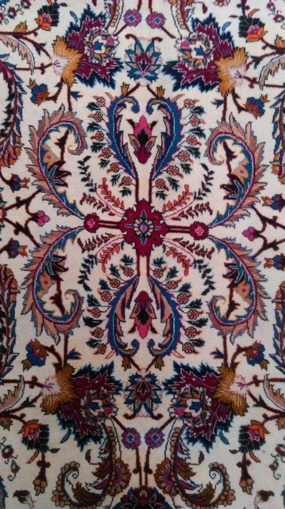 Handcrafted-Persian-Mashad-Rug.jpg