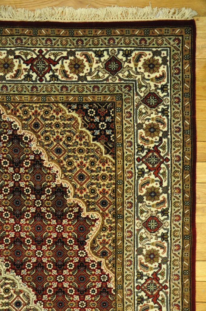 Hand-knotted-Wool-Silk-Tabriz-Mahi-Rug.jpg