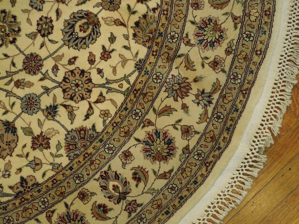 Fine-Quality-Wool-Silk-Round-Rug.jpg