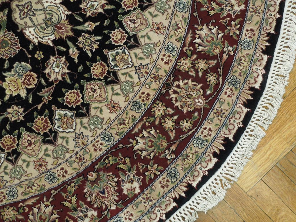 Fine-Quality-Wool-Silk-Round-Rug.jpg 