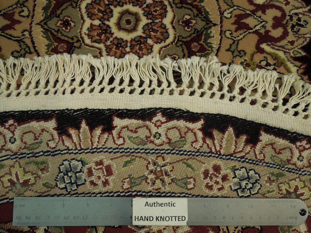 Fine-Quality-Wool-Silk-Round-Rug.jpg 